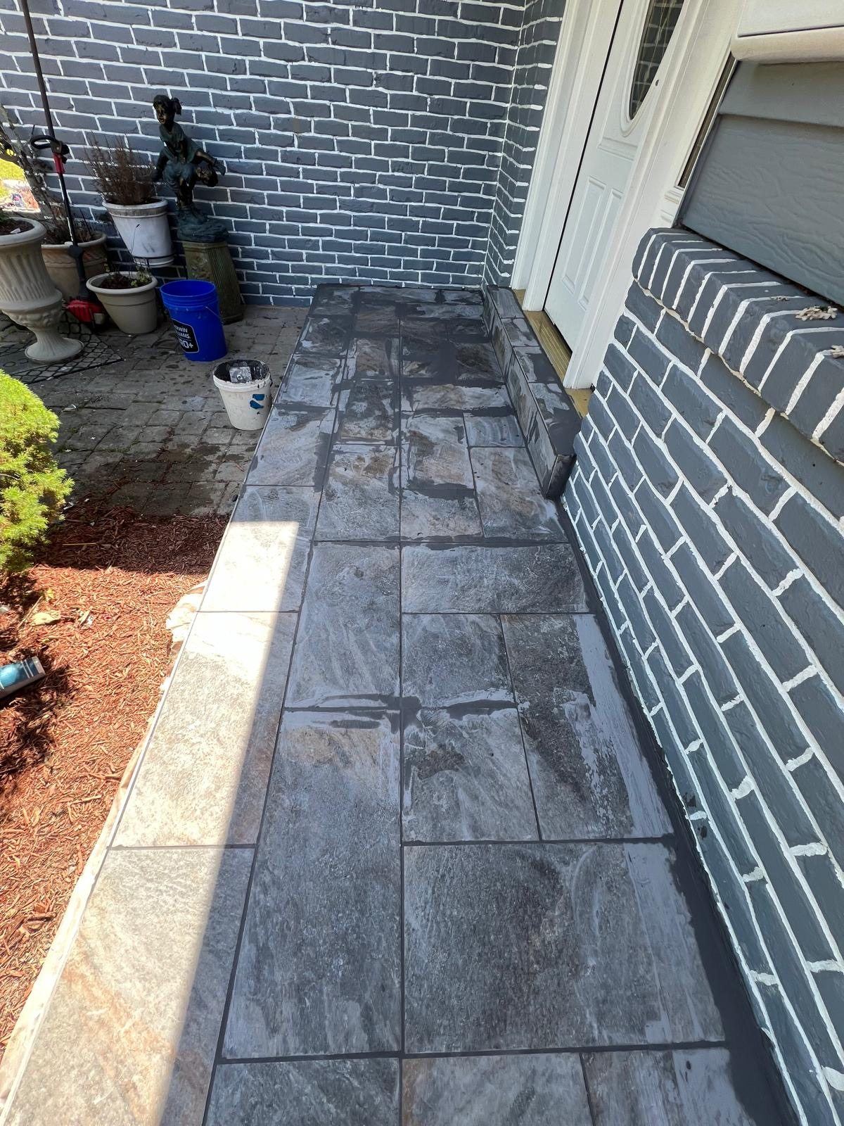 Front entry hardscape tile walkway