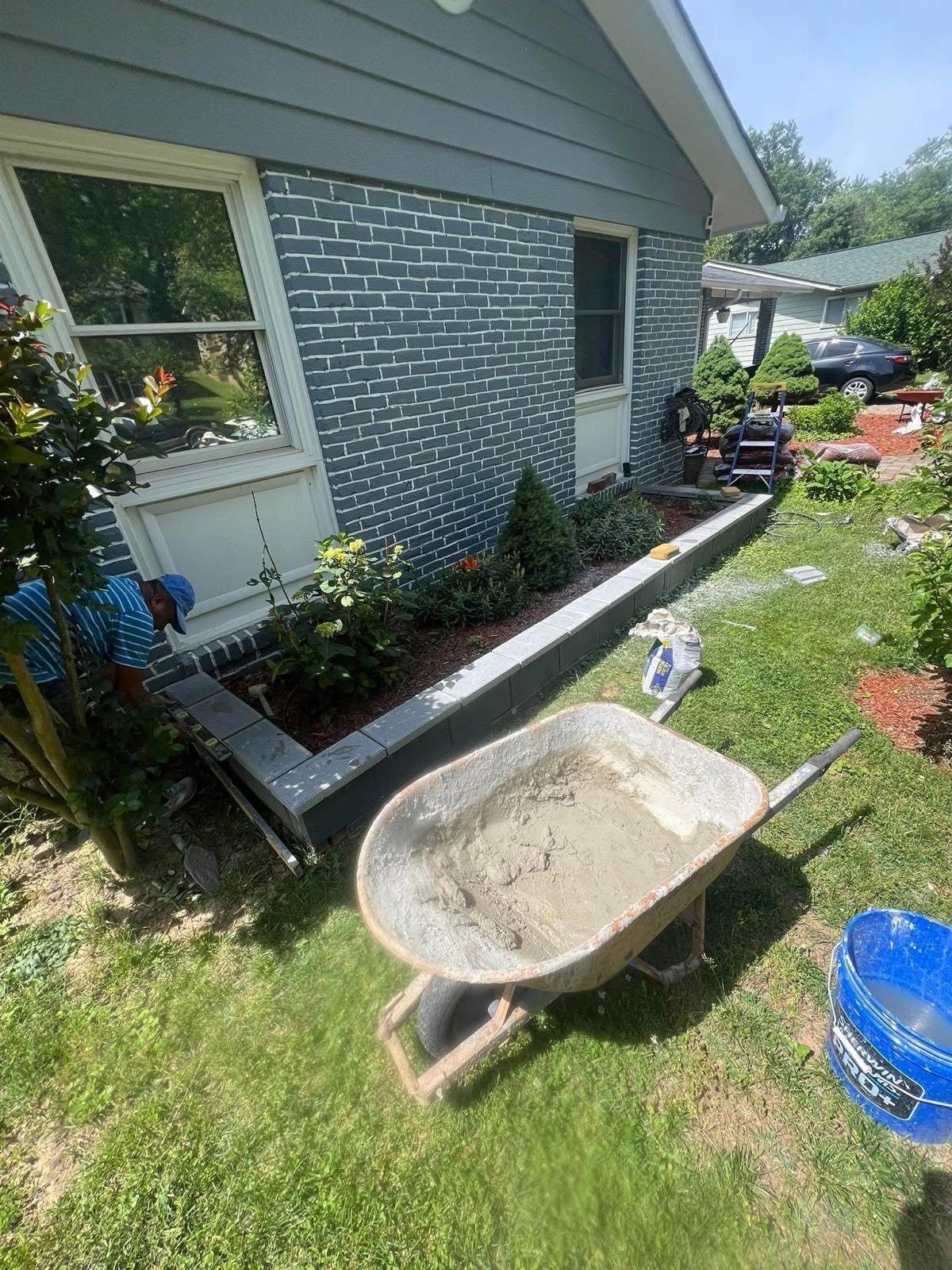 Painted brick with masonry planter bed
