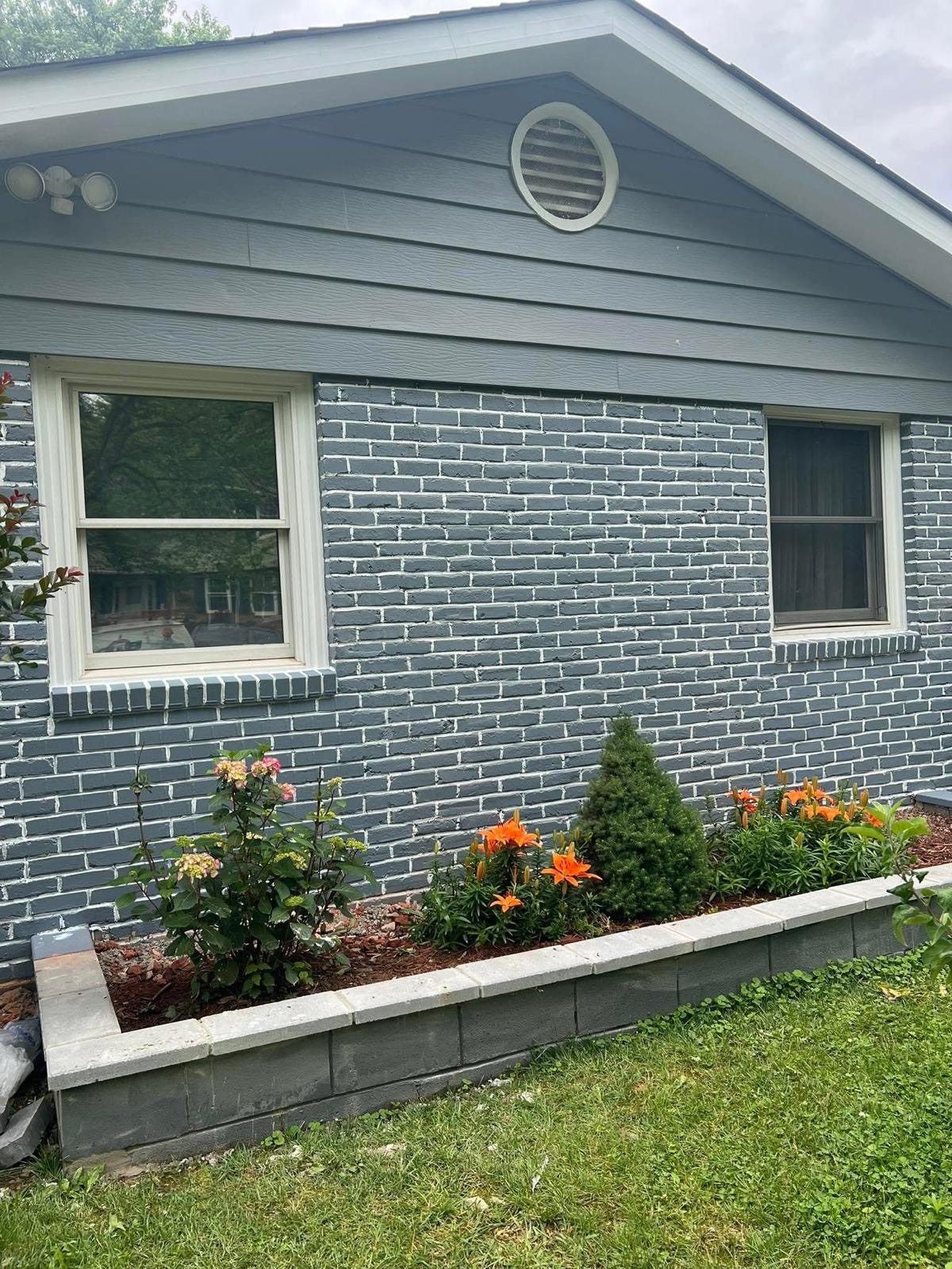 Exterior brick home painted modern gray