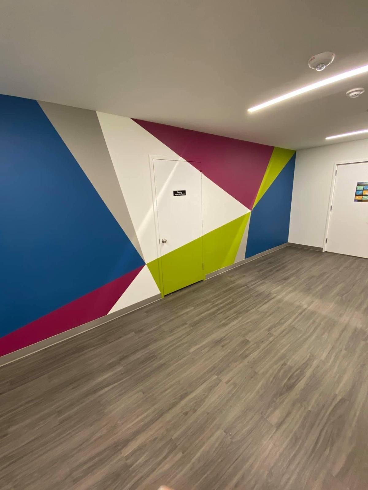 Geometric painted mural on interior wall